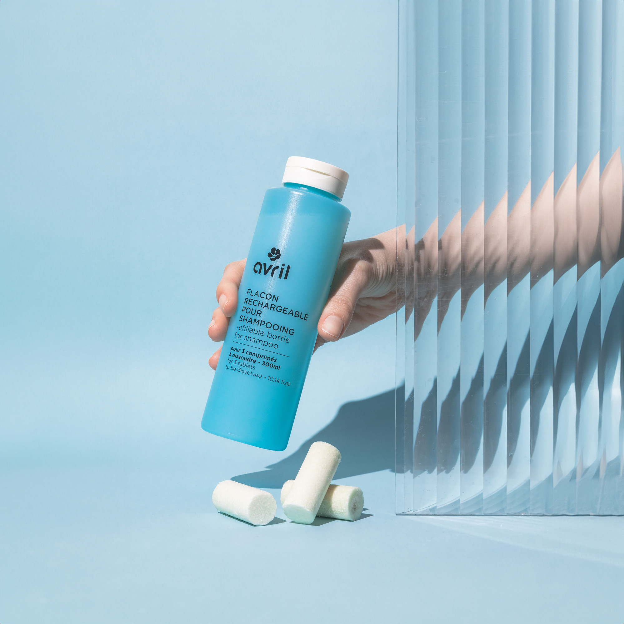 Refillable shampoo bottle